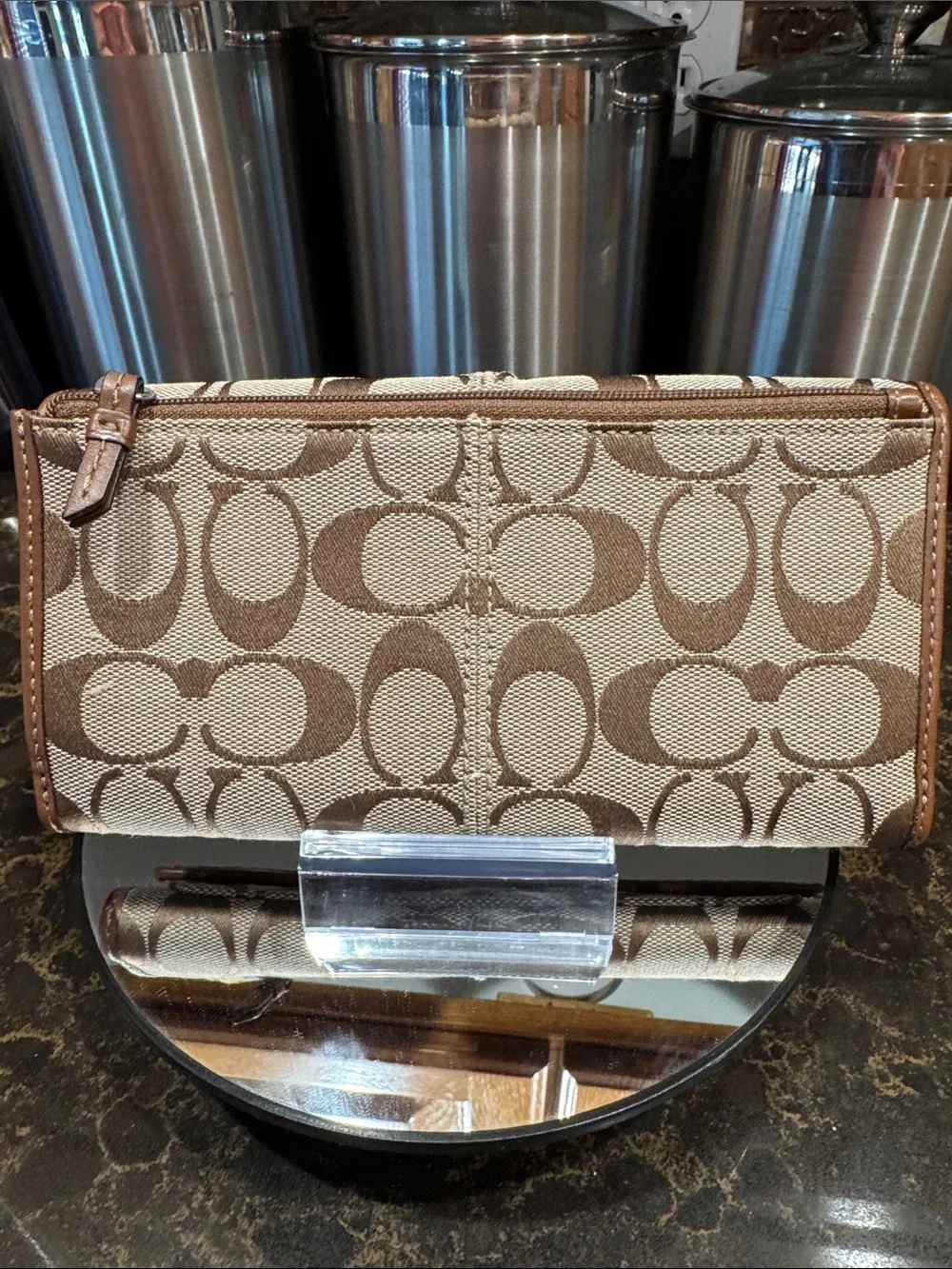 Coach Tan Signature “C” Canvas trifold Wallet with Brown Leather Trim embossed